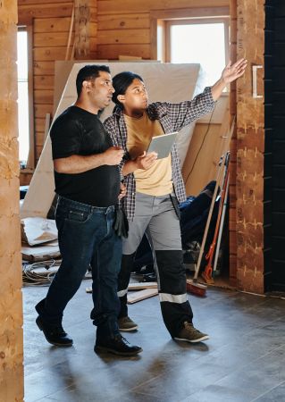 Two People Checking on a Construction Project