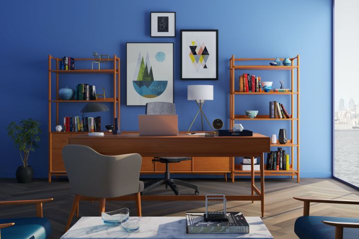 Brown Wooden Desk With Rolling Chair and Shelves Near Window